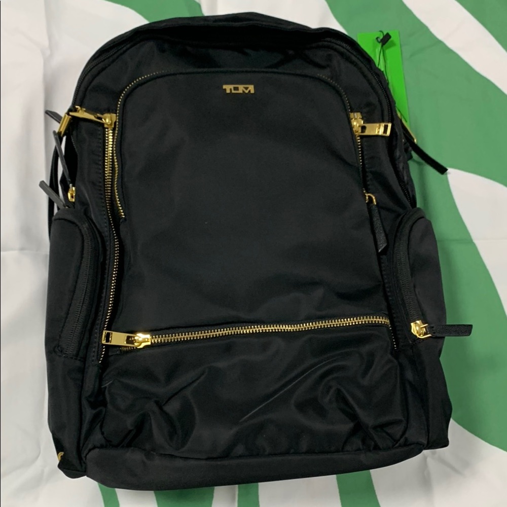 Tumi Jet Black Backpack with Gold Zippers